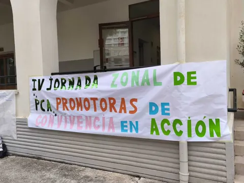 pancarta de promoción de la convivencia en acción